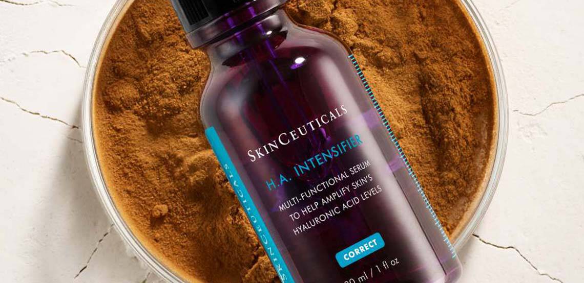 SkinCeuticals HA Intensifier Hyaluronic Acid Serum in a glass bottle with glass dropper